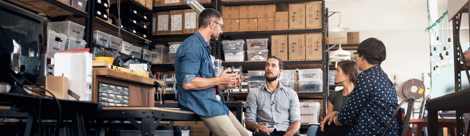 group of professionals in a warehouse
