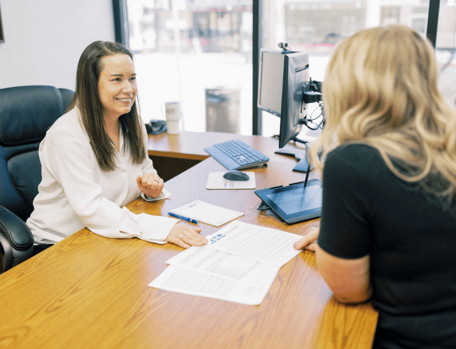 Lender explaining documents to customers