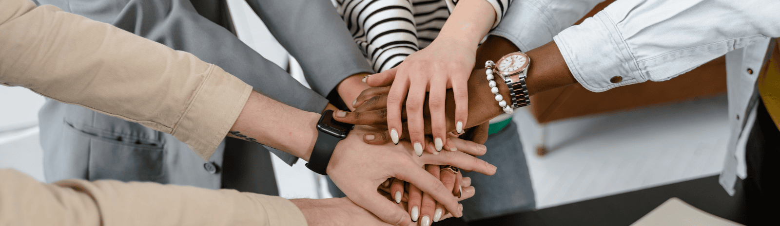 Team hands in a circle